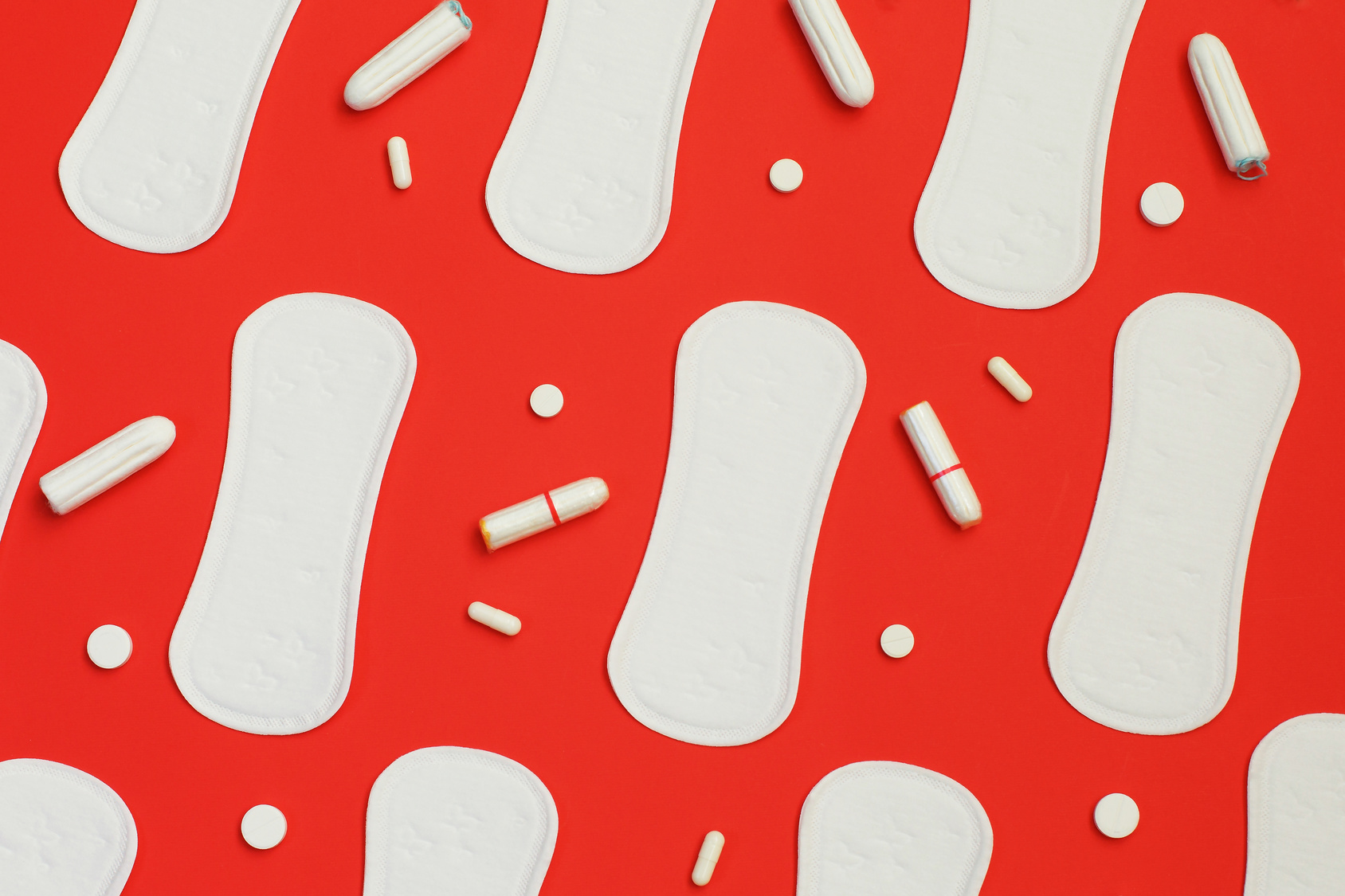 Illustration mit Binden, Tampons und Tabletten